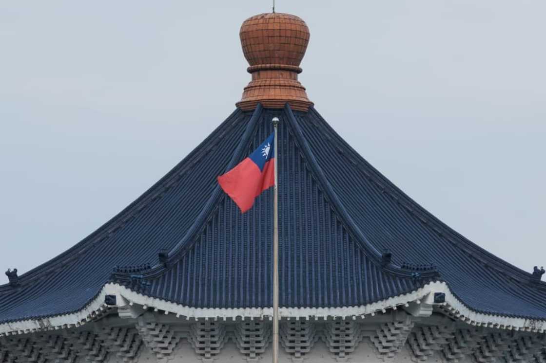 The Taiwanese flag waves at the Chiang Kai-shek Memorial Hall in Taipei