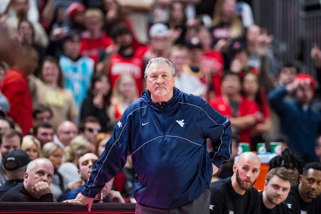 Bob Huggins of the West Virginia Mountaineers stands on the sideline during a game Bob Huggins of the West Virginia Mountaineers stands on the sideline during a game