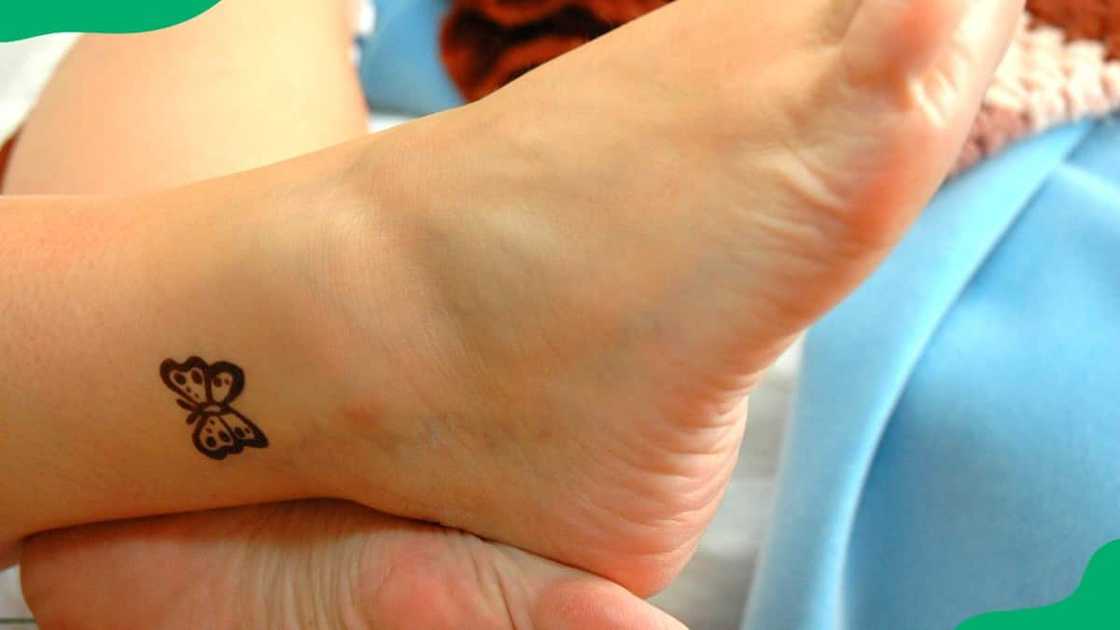 Wrap-around ankle tattoo Wrap-around ankle tattoo