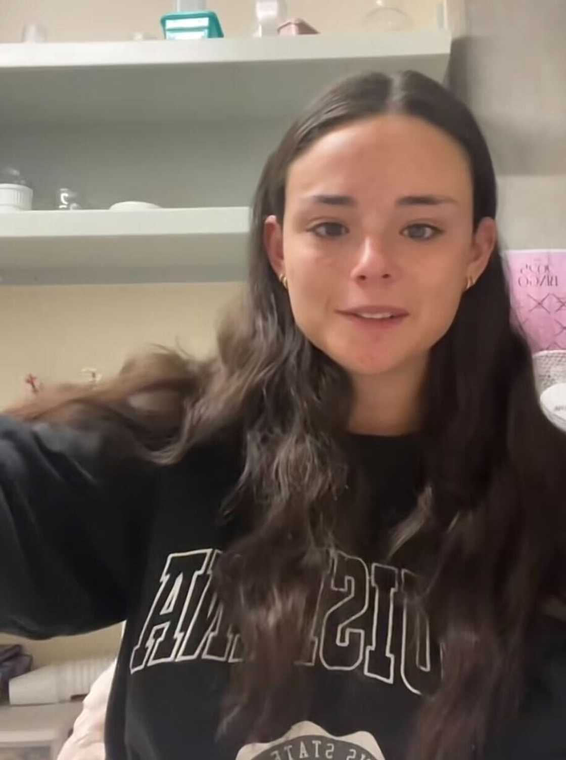 A young woman in South Africa posed in a TikTok video to showcase her Woolworths outfit. A young woman in South Africa posed in a TikTok video to showcase her Woolworths outfit.