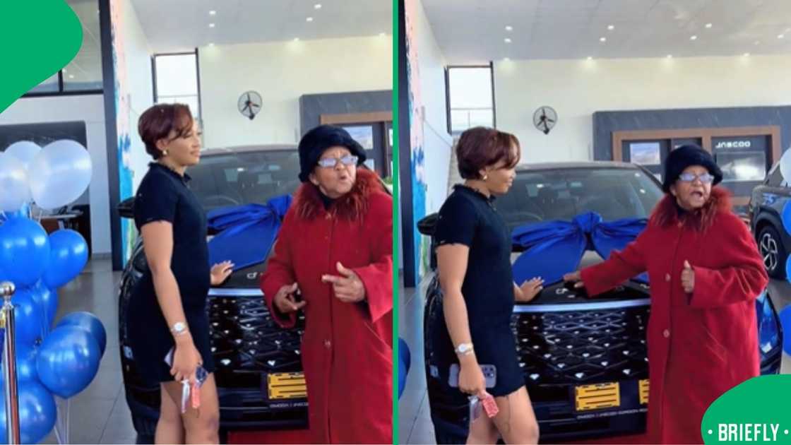 A young woman received her new black Omoda, inviting her grandmother to be part of the day