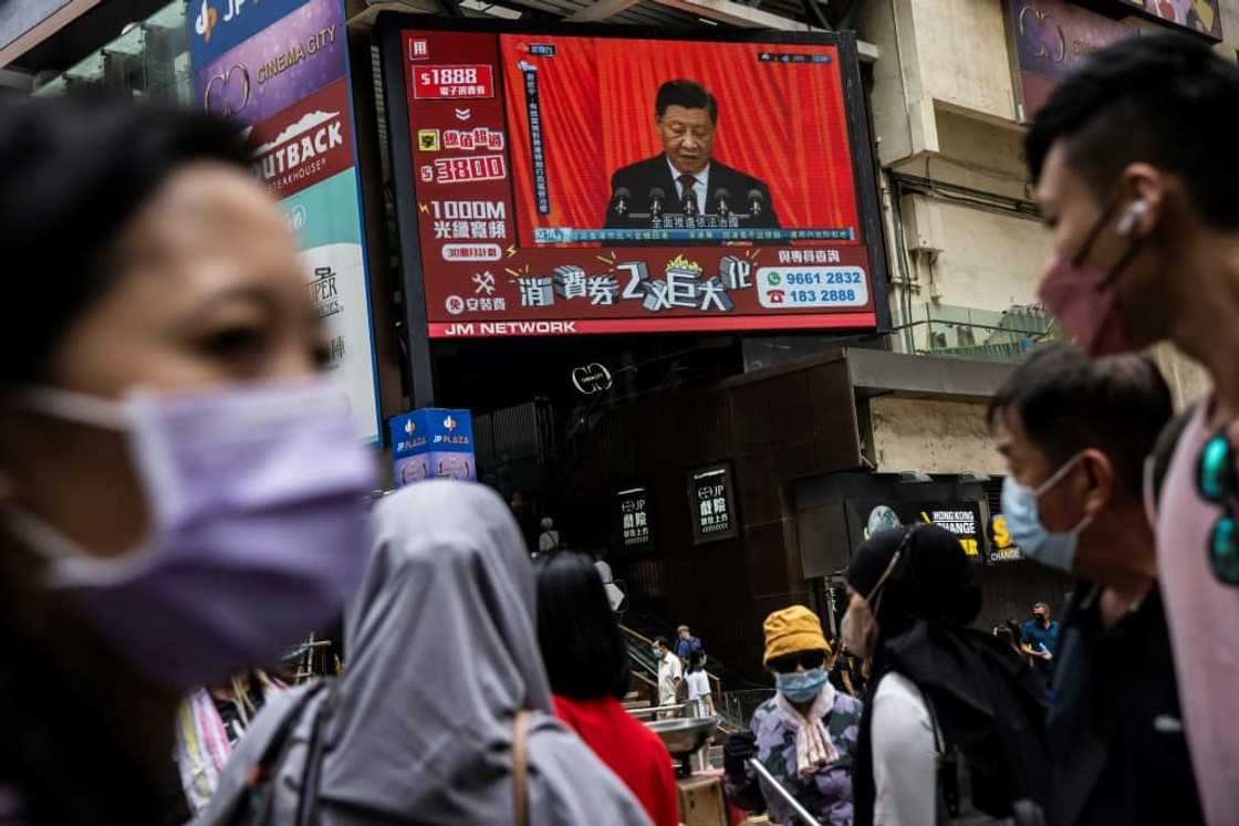 President Xi's speech at the Communist Party congress seen from the street in Hong Kong President Xi's speech at the Communist Party congress seen from the street in Hong Kong