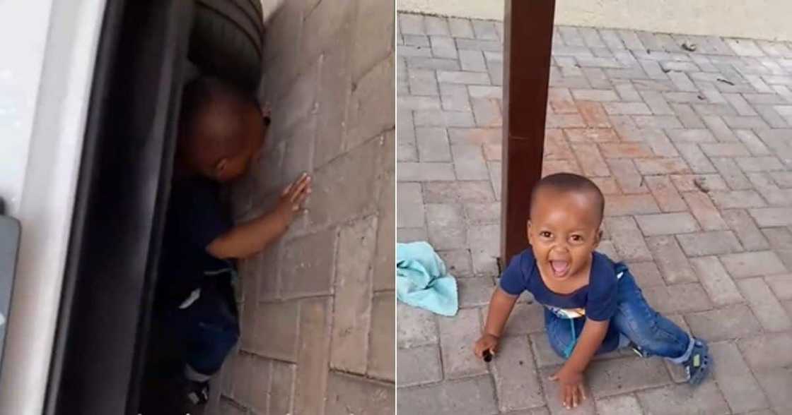 Boy hudes under VW Polo during hide and seek