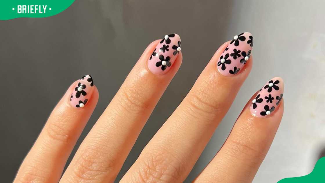 Dark florals almond nail design Dark florals almond nail design