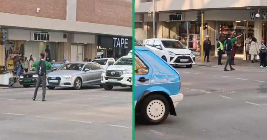 A high school student directs traffic during rush hour in the Pretoria CBD