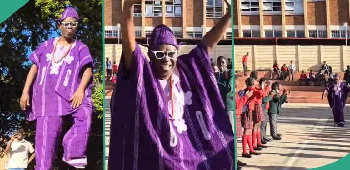 Nigerian teacher in South Africa storms school in native attire. Nigerian teacher in South Africa storms school in native attire.