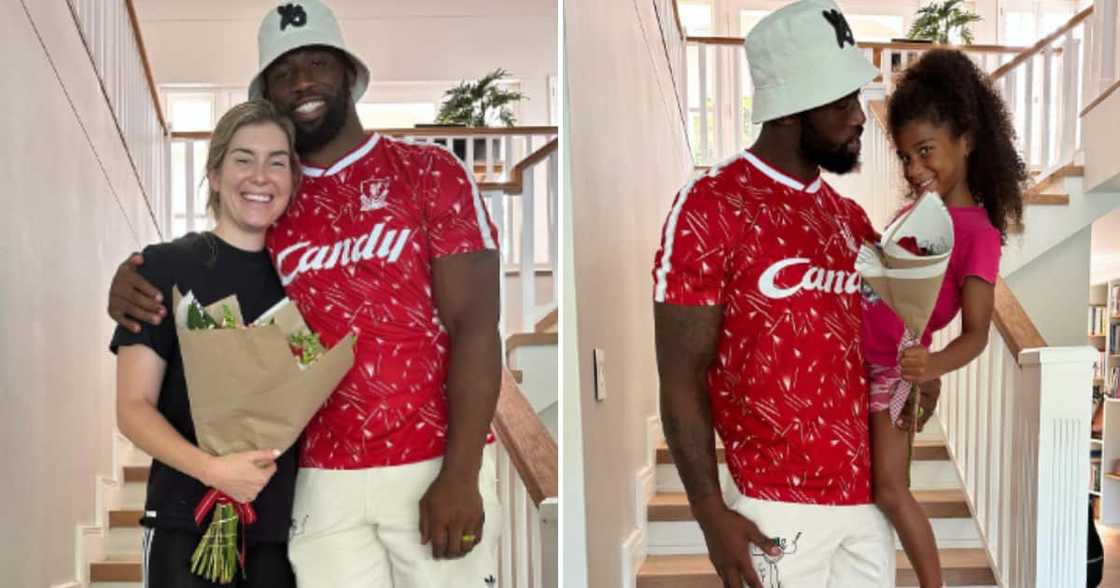 Siya Kolisi giving Rachel and Keziah roses Siya Kolisi giving Rachel and Keziah roses