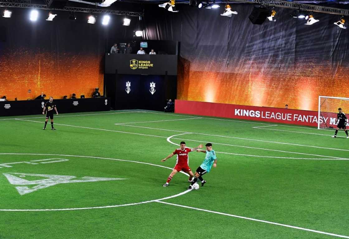 Players of Jijantes FC (L) and PIO FC teams vie for a ball on a 2 vs 2 period at the Cupra Arena stadium in Barcelona Players of Jijantes FC (L) and PIO FC teams vie for a ball on a 2 vs 2 period at the Cupra Arena stadium in Barcelona