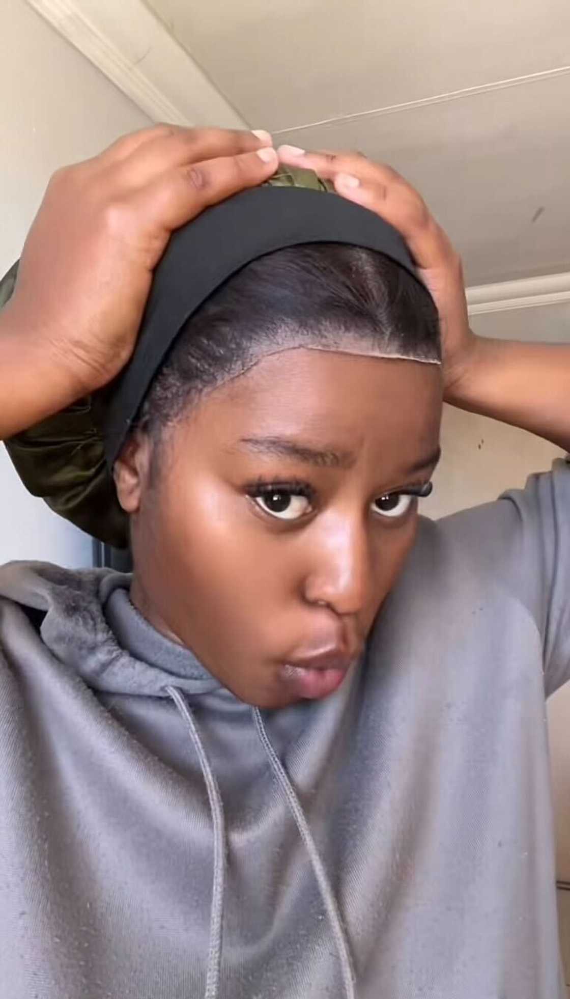 A woman in South Africa unveils her tips for revamping her glued wig while wearing it. A woman in South Africa unveils her tips for revamping her glued wig while wearing it.