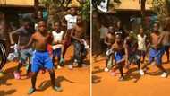 Cheerful kids bust a few dope moves as their peers cheer, peeps groove along behind their screens