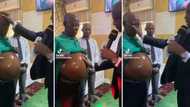 African pastor prays for man with pregnant-like stomach, video of church proceedings spark online debate