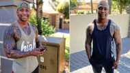 Off the market: NaakMusiq shows off his new lady love and is smitten