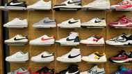 Tepid Nike outlook dents shares as it touts Olympic offerings