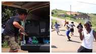 Taxi passengers flee for their lives from a deadly black mamba
