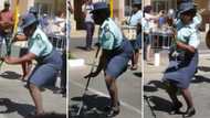 Vibey police officer steals the show with her killer dance moves during a parade, peeps love the video