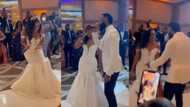 Bride confidently raps during wedding reception as groom hypes her up