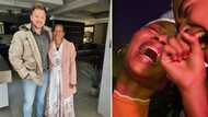 Tiktok stars Malcolm Wentzel and Tembi Ubisi pose for a photo, lady shoots her shot and gets dragged online