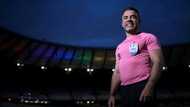 Removing 'camouflage,' Brazil football referee comes out