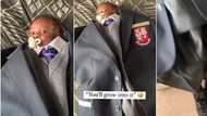 Dad dresses little son in oversized suit and trousers on his first day of school, funny video goes viral