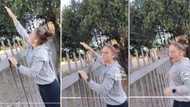 Young lady touches electric fence and sufferers a nasty shock in funny video, Mzansi cracks jokes at her stunt