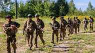 Neighbouring Russia, Latvians prep for war