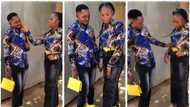 Cute couple rocks matching yellow & black attire, putting people in valentine spirit