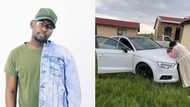 Mzansi touched by pic of uGogo praying over man's new Audi: 'Uqedile uma kunje'