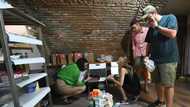 Far from home, Russian exiles help Ukrainian refugees