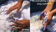 Woman tries hand-washing laundry with extra long nails, Mzansi in tears over hilarious effort