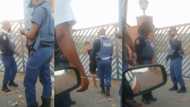 Short clip of SAPS member slapping woman has Mzansi begging for more info: "Edited to fulfil a narrative"