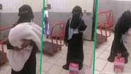 Woman dressed in hijab caught trying to steal box wine disguised as baby in viral TikTok video
