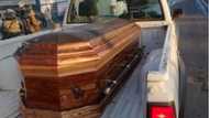 Coffin found but cops still on the hunt for 'missing' blue couch after looting