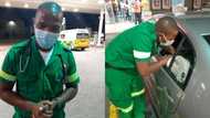 Paramedics filling petrol help woman with breathing difficulties