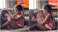 Emotional moment little girl makes baby sister to stop crying, wipes her tears in viral video