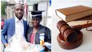 Proud man lets mom wear his graduation gown as he bags law degree