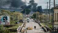 Ukraine push slowed by rain, river and Russian holdouts