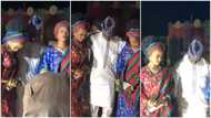 Are they fighting? Nigerians react as man dances with 2 young brides who look very sad in viral video