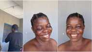 Mom lights up social media reactions with priceless smile as son takes photos