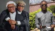 Young man celebrates becoming lawyer with his father who is also a lawyer
