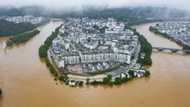 Hundreds of thousands evacuated in China after heaviest rains in decades