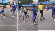 Footballer effortlessly dribbles his opponent in street soccer