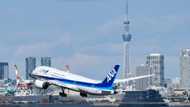 Japan's top airline ANA reports first net profit in 10 quarters