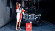 From receptionist to boss lady: Entrepreneur celebrates employee's sleek new ride