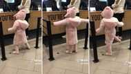 Little girl busts impressive moves to 'Mnike' dance challenge in her fluffy pink pyjamas , leaves SA in awe