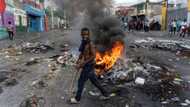 US team discusses help for troubled Haiti but cautious on troops