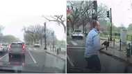 Selfless man comes down from car with umbrella, gives it to someone on wheelchair in the rain, video goes viral