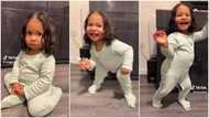 "No bills to pay": Sad baby jumps up & dances when mum plays Kizz Daniel's 'Rich Till I Die'