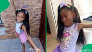 Little girl amazed family with waist-length hair during hair wash day at home