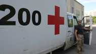 In eastern Ukraine, volunteers recover bodies of war dead