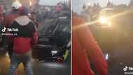 Cape Town crowd lifts flipped car in TikTok video like it's no big deal